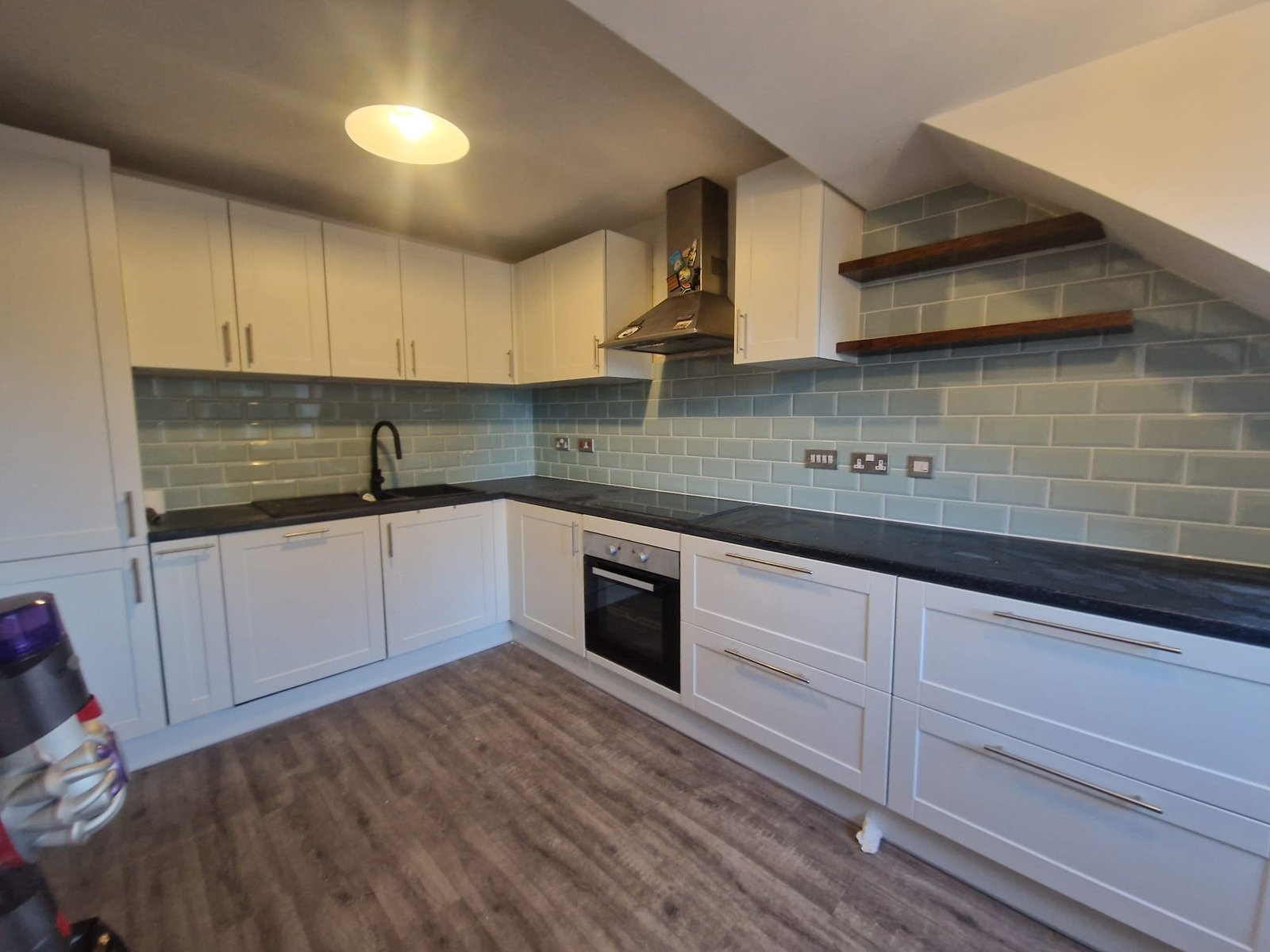 L-Shaped White Kitchen with Floating Shelves – Stockport Kitchen Design Ideas