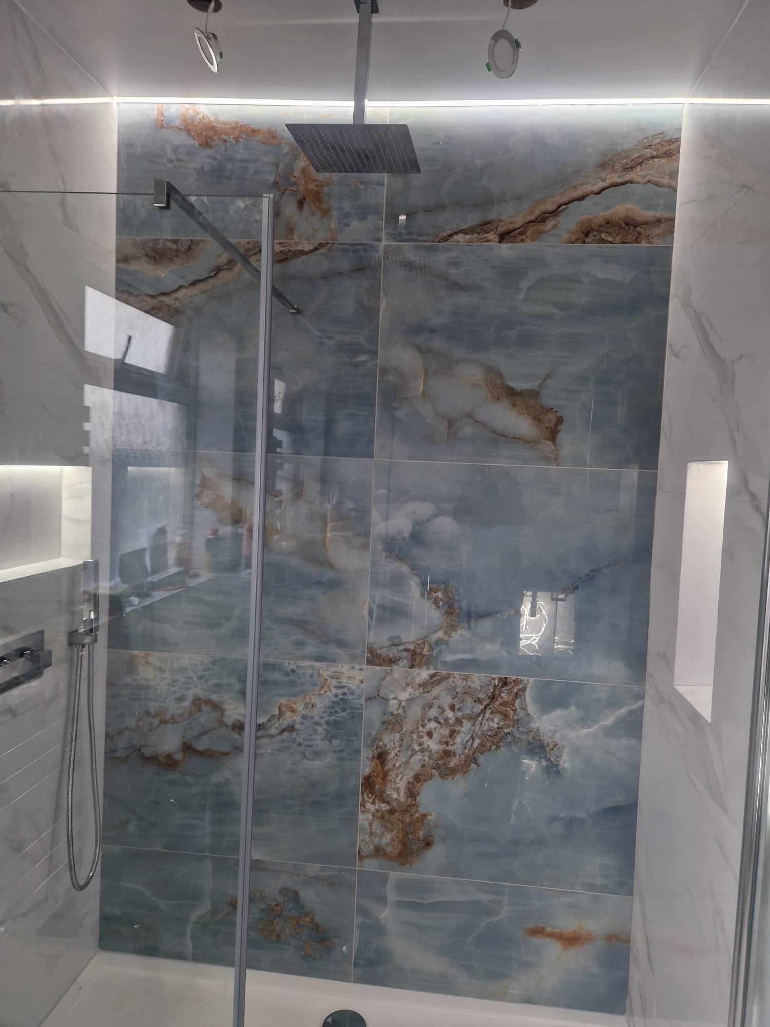 Walk-In Shower with Dramatic Blue Stone-Effect Feature Wall – Oldham Bathroom Design Ideas